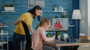 Homeschool parent outsourcing subjects with virtual tutor support.